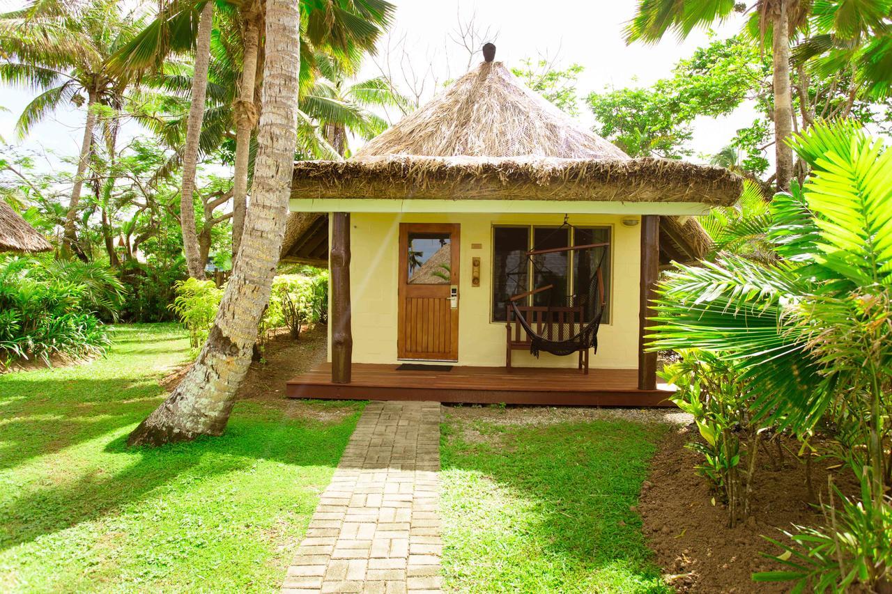 Outrigger Fiji Beach Resort Korotogo Exterior photo A bungalow at the resort